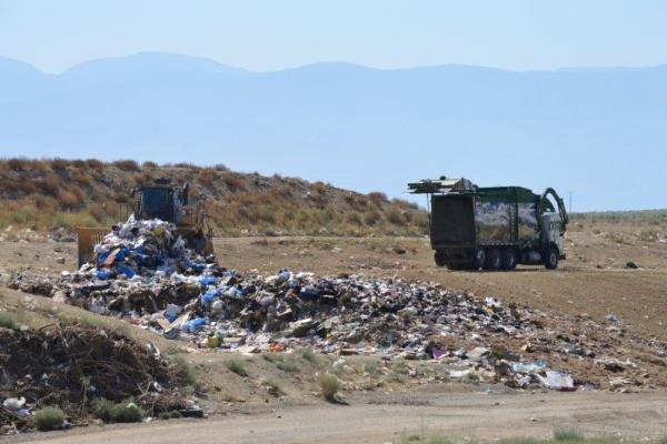 The compactor working the active face at the landfill.